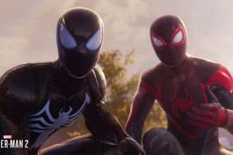 Miles Morales and Peter Parker from Marvel's Spider-Man 2 looking into the camera