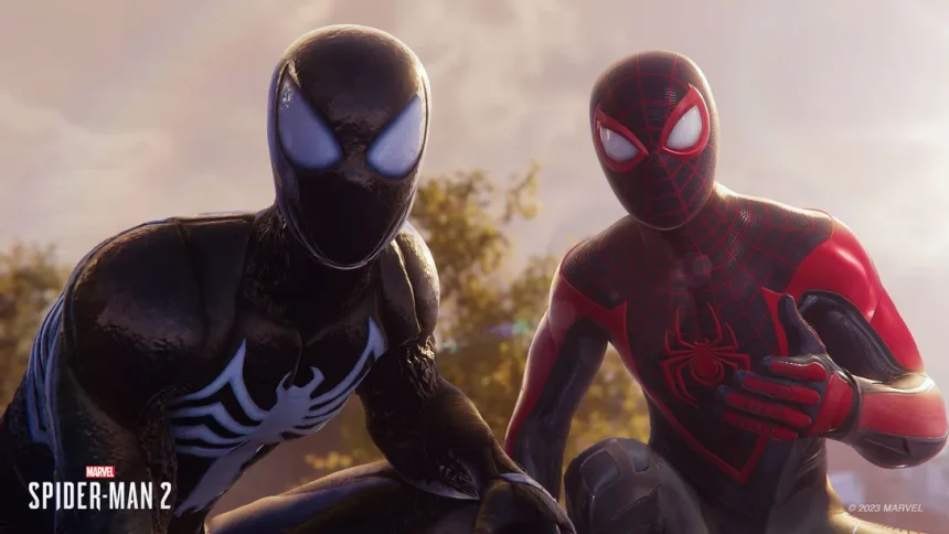 Miles Morales and Peter Parker from Marvel's Spider-Man 2 looking into the camera