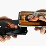 Two iPhones sharing contacts via NameDrop