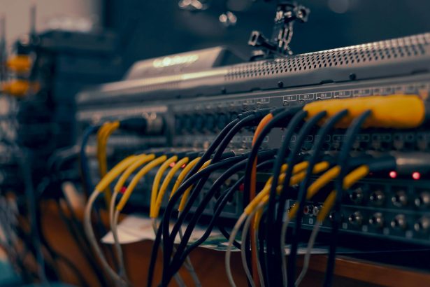 a close up of a computer with wires and cables