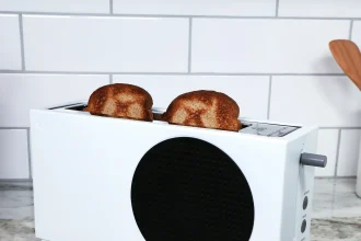 The Xbox Series S toaster with two slices of bread.