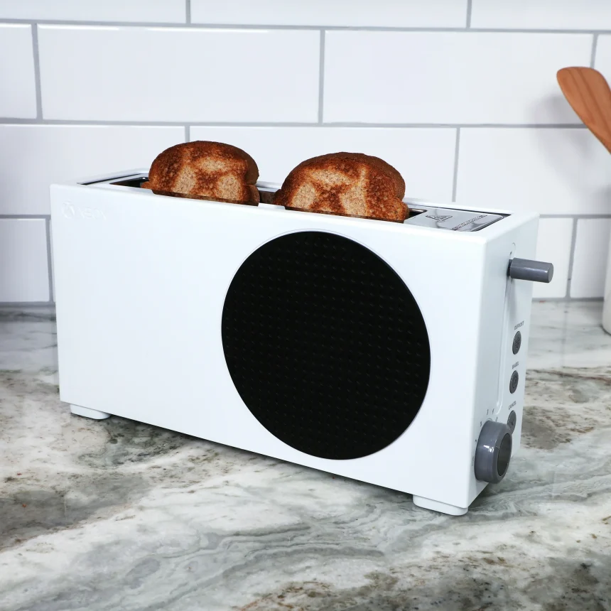 The Xbox Series S toaster with two slices of bread.