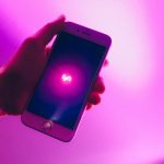 photo of person holding iphone